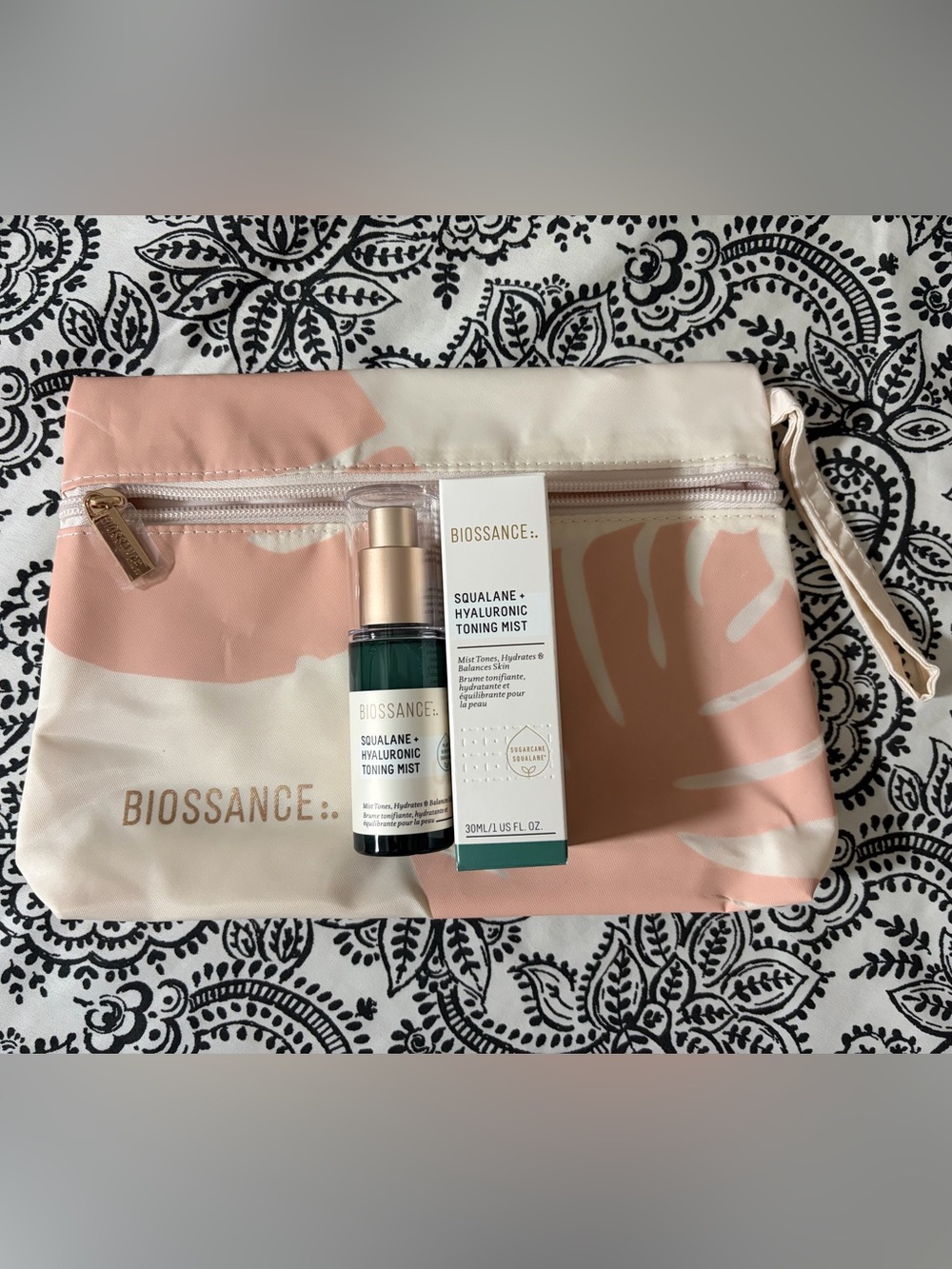 Biossance Toning Mist and pouch